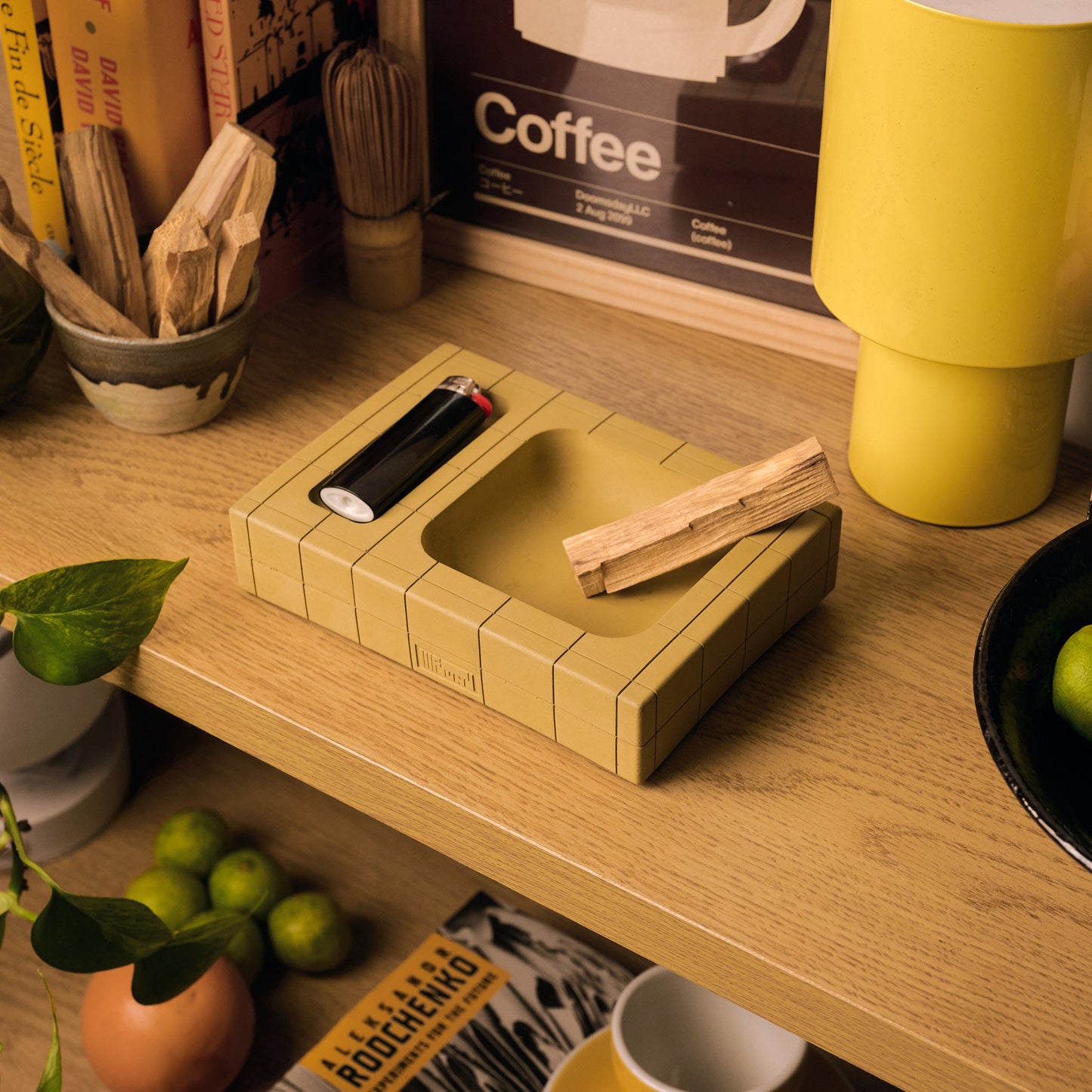 Ochre Illfound Pool Tray one enetri shelf and surrounded by palo santo and limes