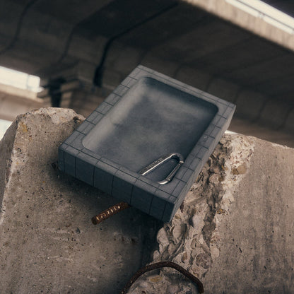 concrete catchall sitting on concrete ballard